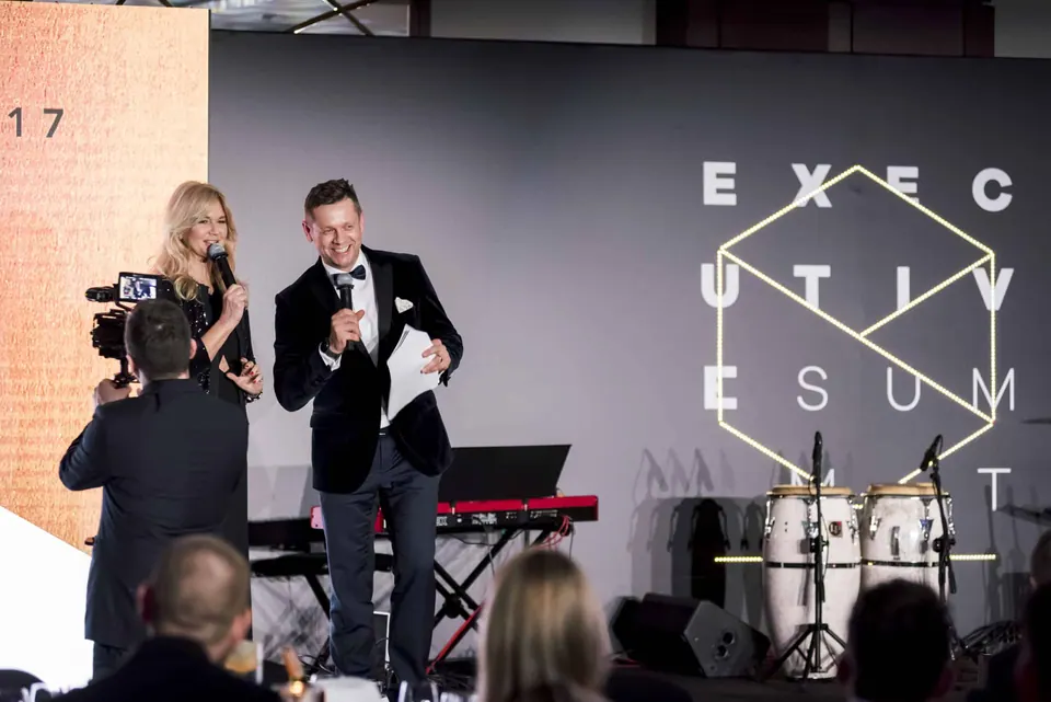 Hosts on the Executive Summit 2018 stage